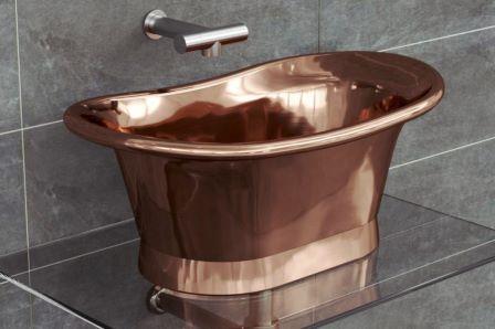 New Art Deco bathroom matching bateau vanity basin in antique copper