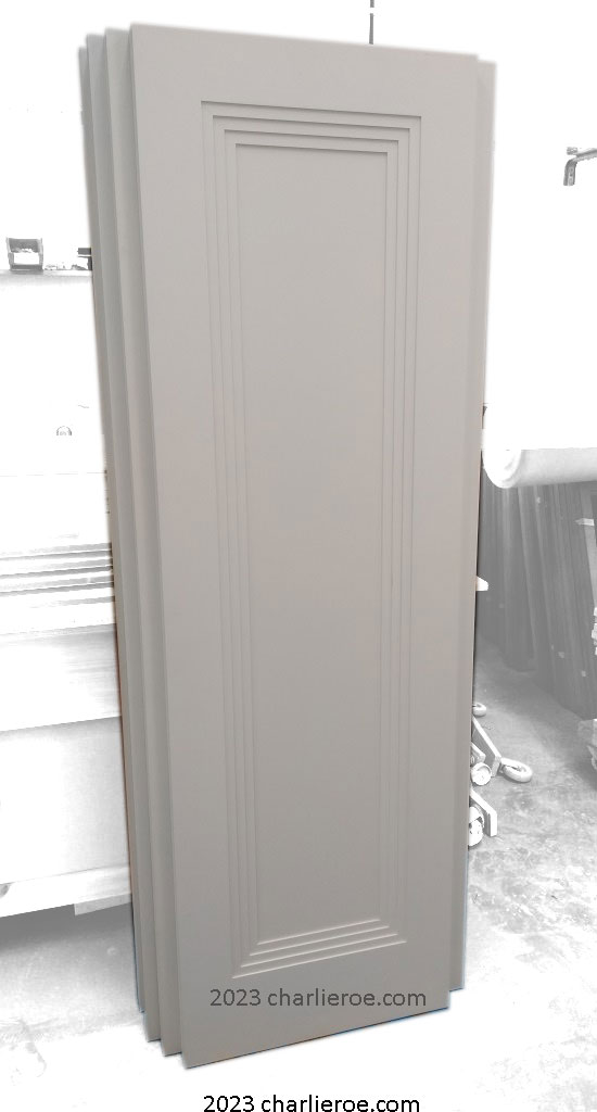 new bespoke Art Deco wood interior door with a primed finish