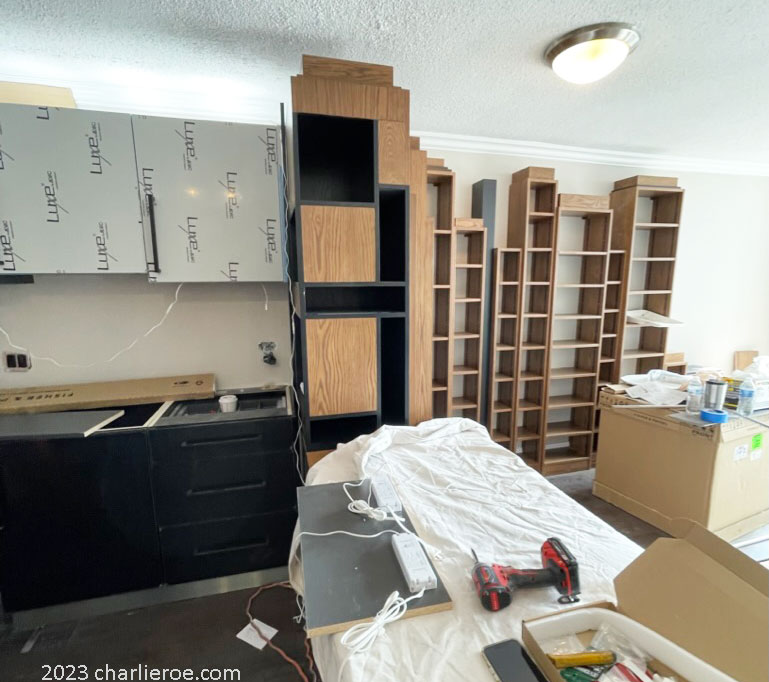 New Paul Frankl Art Deco Skyscraper 'skyline' bookshelves boards being installed in the appartment