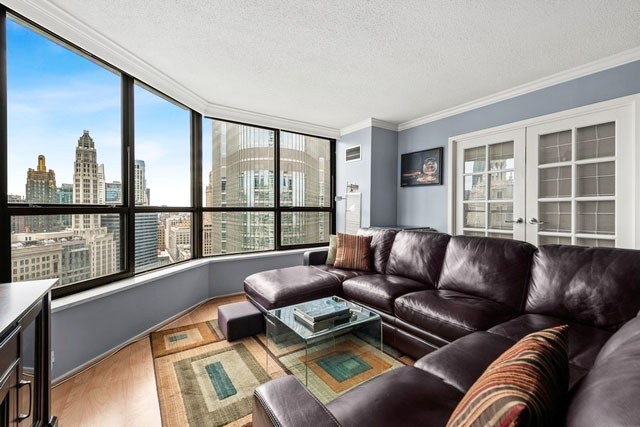 Chicago condo where a pair of New Paul Frankl Art Deco Skyscraper style painted lacquered bookcases will go, in black with silver edges