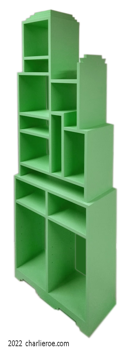 New Paul Frankl Art Deco Skyscraper style painted lacquered bookcase in green with silver edges shown in a Chicago condo