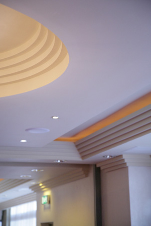 Art Deco stepped plaster cornice moulding with concealed lighting