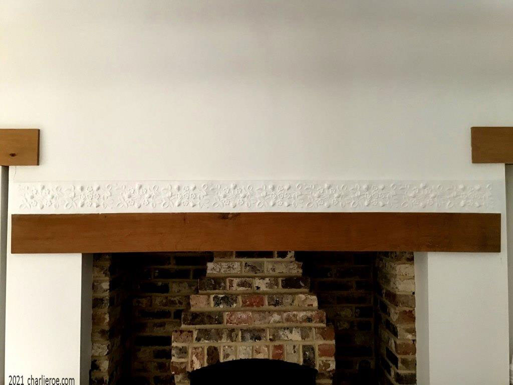 new Cotwolds style Arts and Crafts Movement Plaster frieze moulding above a fireplace
