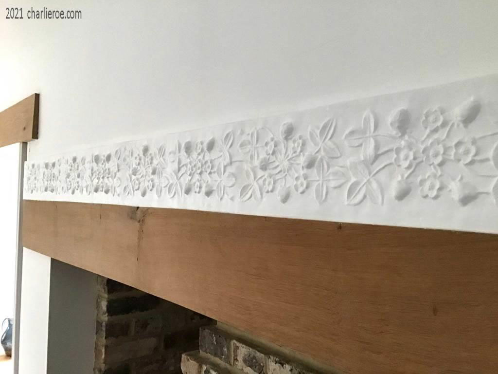 new Cotwolds style Arts and Crafts Movement Plaster frieze moulding above a fireplace