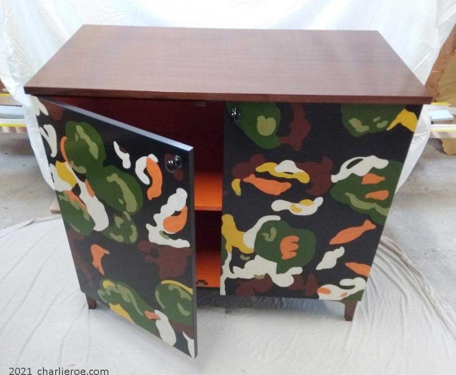 The colours are built up one at a time for the new Omega workshops painted 'Lilypond' design used for a pair of 2 door cabinet cupboards or sideboards