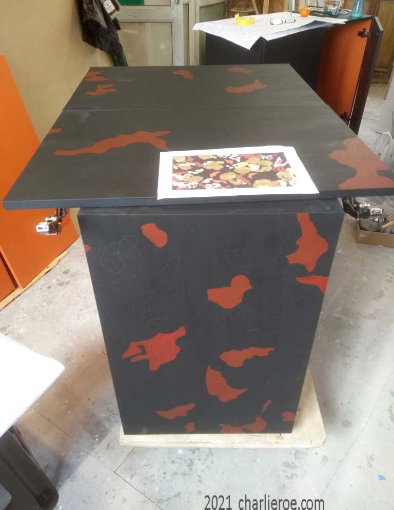 The colours are built up one at a time for the new Omega workshops painted 'Lilypond' design used for a pair of 2 door cabinet cupboards or sideboards