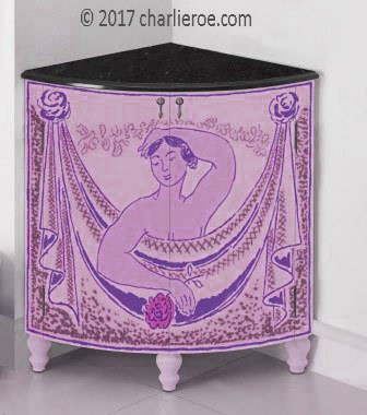new Bloomsbury Group style painted quadrant corner cupboard on turned legs with woman and swag design on the doors