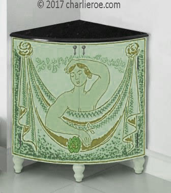 new Bloomsbury Group style painted quadrant corner cupboard on turned legs with woman and swag design on the doors