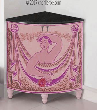 new Bloomsbury Group style painted quadrant corner cupboard on turned legs with woman and swag design on the doors