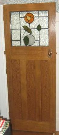 CR Mackintosh new kitchen door with stained glass panel