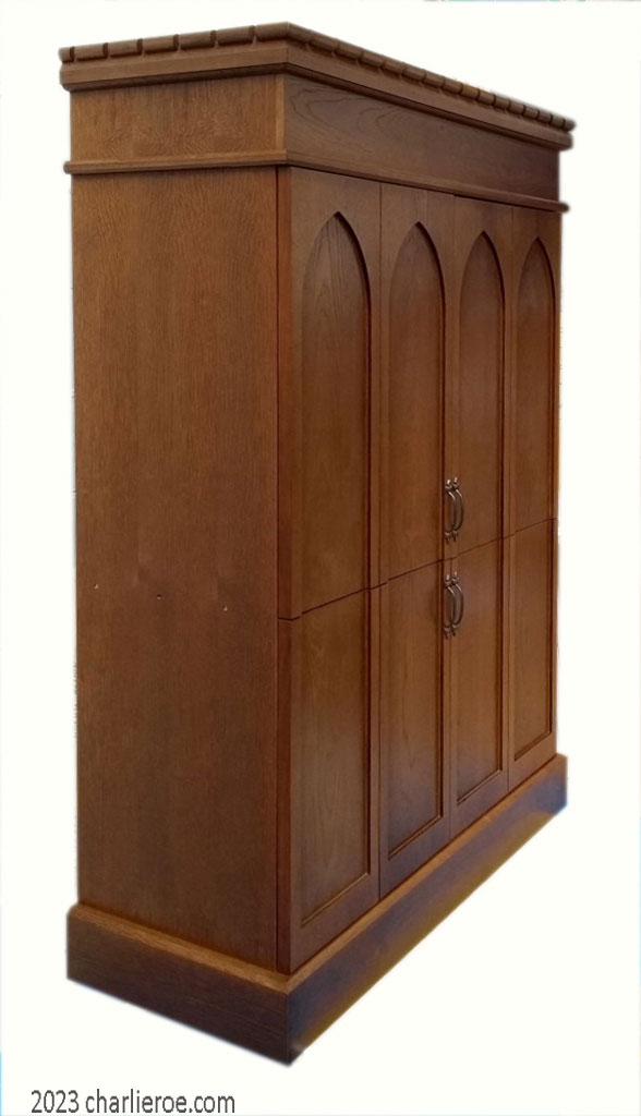 new Gothic Revival Gothique Gotik dark wood entertainment media centre TV unit with lancet arches & bi-fold doors