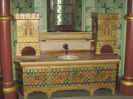 William Burges Gothic Revival painted castellated washstand vanity unit for Lady Bute's bedroom at Castell Coch furniture