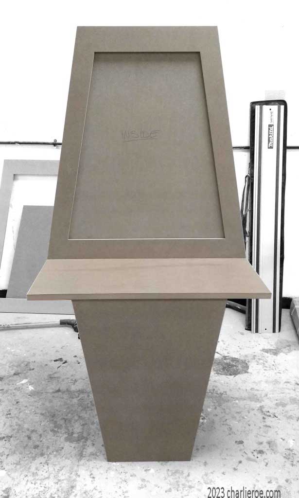 new ancient Egyptian Revival style Pylon shaped painted vanity unit being constructed