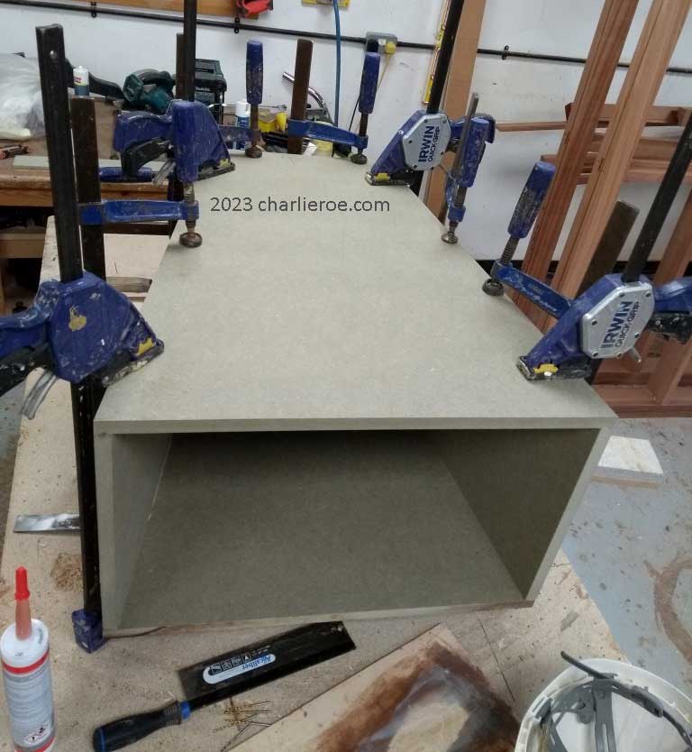 new ancient Egyptian Revival style Pylon shaped painted console table cabinet being constructed