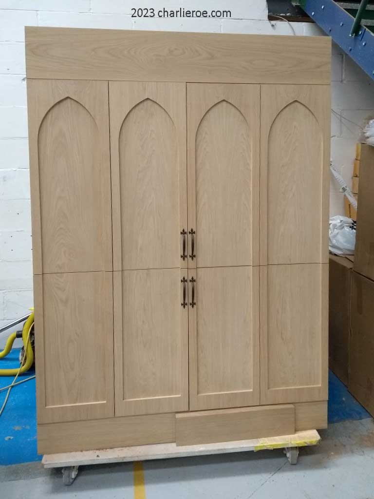 new Gothic Revival Gothique Gotik dark wood bookcases & entertainment media centre TV unit with bi-fold doors with lancet arches