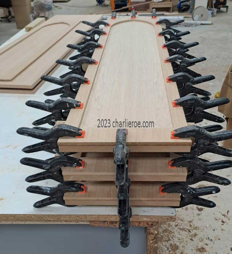 new Gothic Revival Gothique Gotik breakfront dark wood bookcases & entertainment media centre TV unit - clamping the various components during construction